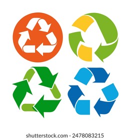 Four recycling symbols in different colors on white background