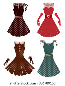 Four retro dresses isolated on white.
