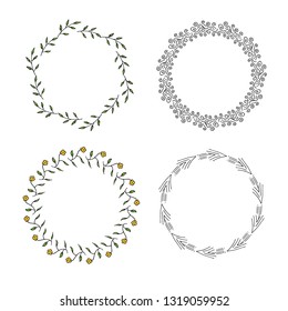 Four round frames made of green branches and decorative elements. Wreaths on white background for your design