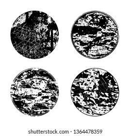 Four round grunge shapes. Set of labels and badges. Blank shapes. Vector textures.
