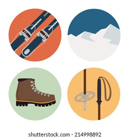 Four round vector icons of touring skiing elements featuring skis, winter hiking boots, skiing poles and mountains
