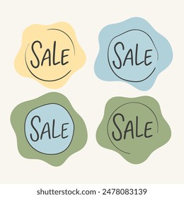 Four sale stickers in different colors on white background