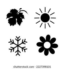 Four seasons icon set. 4 Vector graphic element illustrations representing winter, spring, summer, autumn. Snowflake, flower, sun and maple leaf