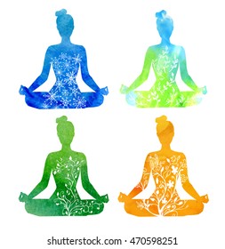 Four seasons of yoga. Set of vector silhouettes of yoga women with blue, green and orange watercolor textures and hand drawn ornaments with snowflakes, leaves and flowers. Lotus pose - Padmasana. 