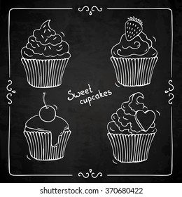Four sketches of cupcakes drawn by chalk on a blackboard