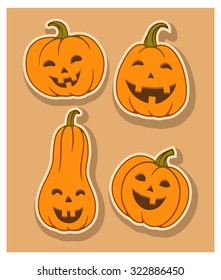 Four smiling halloween pumpkins