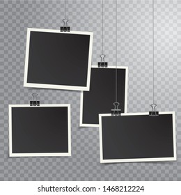 Four square vector photo frames hanging on metal clips with transparent shadow. Vertical and horizontal template photo design	
