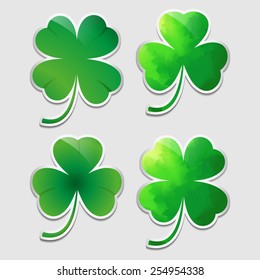 Four stickers with different clover leaves