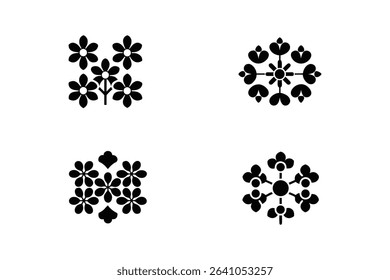Four symmetrical, black and white floral and decorative design elements.