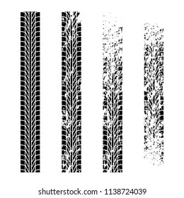 Four tire track silhouettes with different grunge intensivity