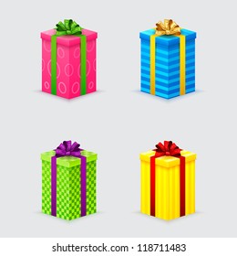 four unopened gift boxes with ribbons and bows with lids