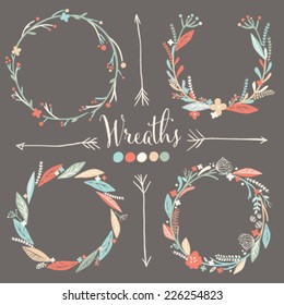 Four vector floral wreaths. Hand drawn design elements set.