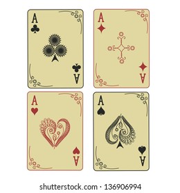 Four vintage Aces of playing cards with patterned suit