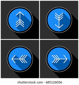 four white, blue arrows with black shadows - different directions in front of a dark gray background