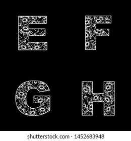 Four white outline floral letter silhouettes isolated on black background