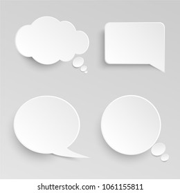 four white paper bubble for speech on gray background