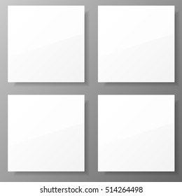 Four white posters on the wall with shadow. Vector illustration. 