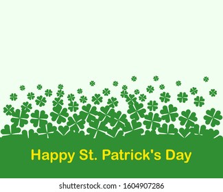 A four-leaf clover as green background. Happy St. Patrick's Day concept.