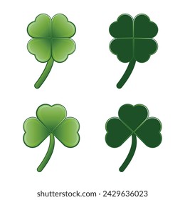Four-leaf and shamrock lucky green clover white isolated background.