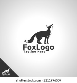 Fox Logo with silhouette style fox looking up and appearance from side concept