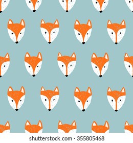 Fox pattern. Seamless background with doodle fox heads. 