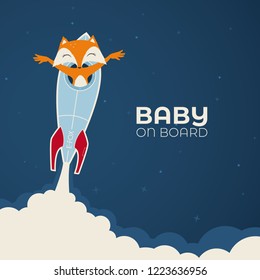 Fox in starter space rocket. Text - Baby on board. Blue background with stars.