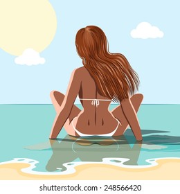 foxy girl sitting in the water of sea. summer concept