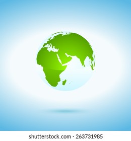 Fragile green globe on the blue background
