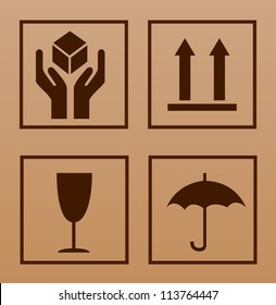 Fragile symbol on cardboard background