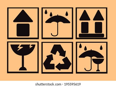 Fragile symbol on cardboard background