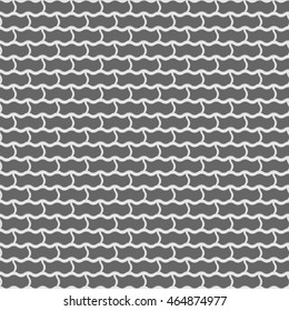 Fragment of road covered with cobblestone. Pattern geometrical ornament. Weave pattern.