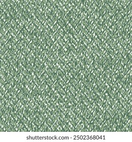 Fragment of a variegated carpet with flecks in green and white tones. Used floor rug. Mat texture. Abstract seamless pattern.