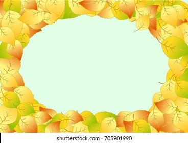 Frame of autumn leaves on a green background