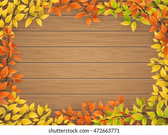 Frame of autumn leaves on wooden planks background. Vector realistic elements for decoration card and design floral frame.
