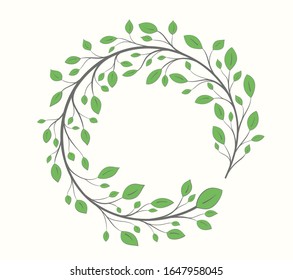 Frame of a branch with green leaves in the form of a circle isolated on a light background