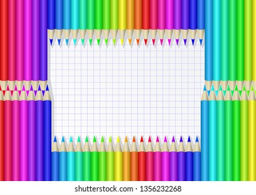 frame from colorful crayons on checkered sheet
