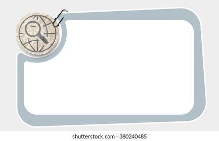 Frame and crumpled slip of paper and magnifier