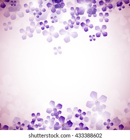 Frame of delicate translucent petals on a blurred background for a romantic web and paper design