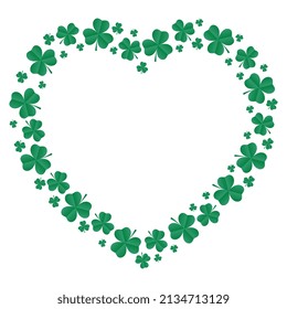 Frame of emerald shamrocks in the shape of a heart. Decorative element for St. Patrick's Day design. Vector illustration