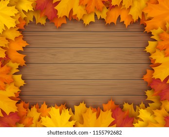 Frame from fallen maple leaves on the background of a wooden vintage table surface. Realistic vector illustration.