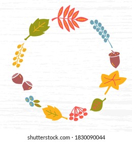 Frame in the form of the Autumn Wreath of leaves, nuts and berries against the textured tree background. Free space in the middle for inscription, title, text. 
For card, invitation, discount, sale.