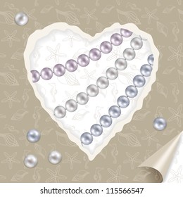frame in the form of heart with pearl threads