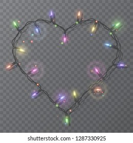 Frame in form of heart with realistic lights, Christmas lights isolated design, Garlands decoration elements. Glowing lights for Xmas Holiday greeting card design.