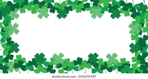 Frame of green clovers on a white background