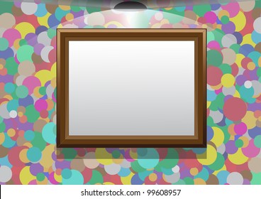 The frame hangs on a colourful wall, illumination by a lamp, a place for the text