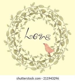 frame from leaves. bird in the leaves