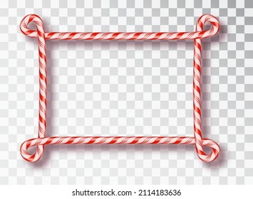 Frame made of candy canes. Blank Christmas border with red and white striped lollipop pattern isolated on transparent background. Holiday design