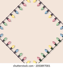 frame with multicolored christmas lights