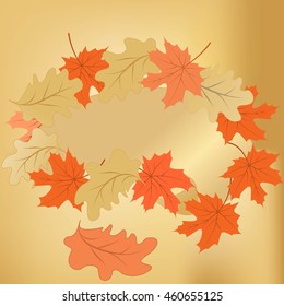 frame of oak and maple leaves on a gold background