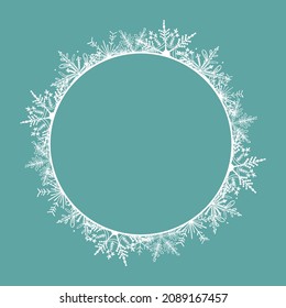 Frame. Round white frame made of snowflakes. Perfect for decorating social networks, photos and text. Christmas frame. Vector.